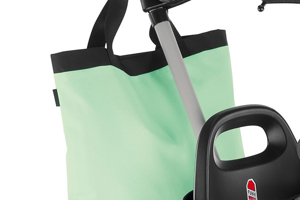 Kipper mit Einkaufstasche